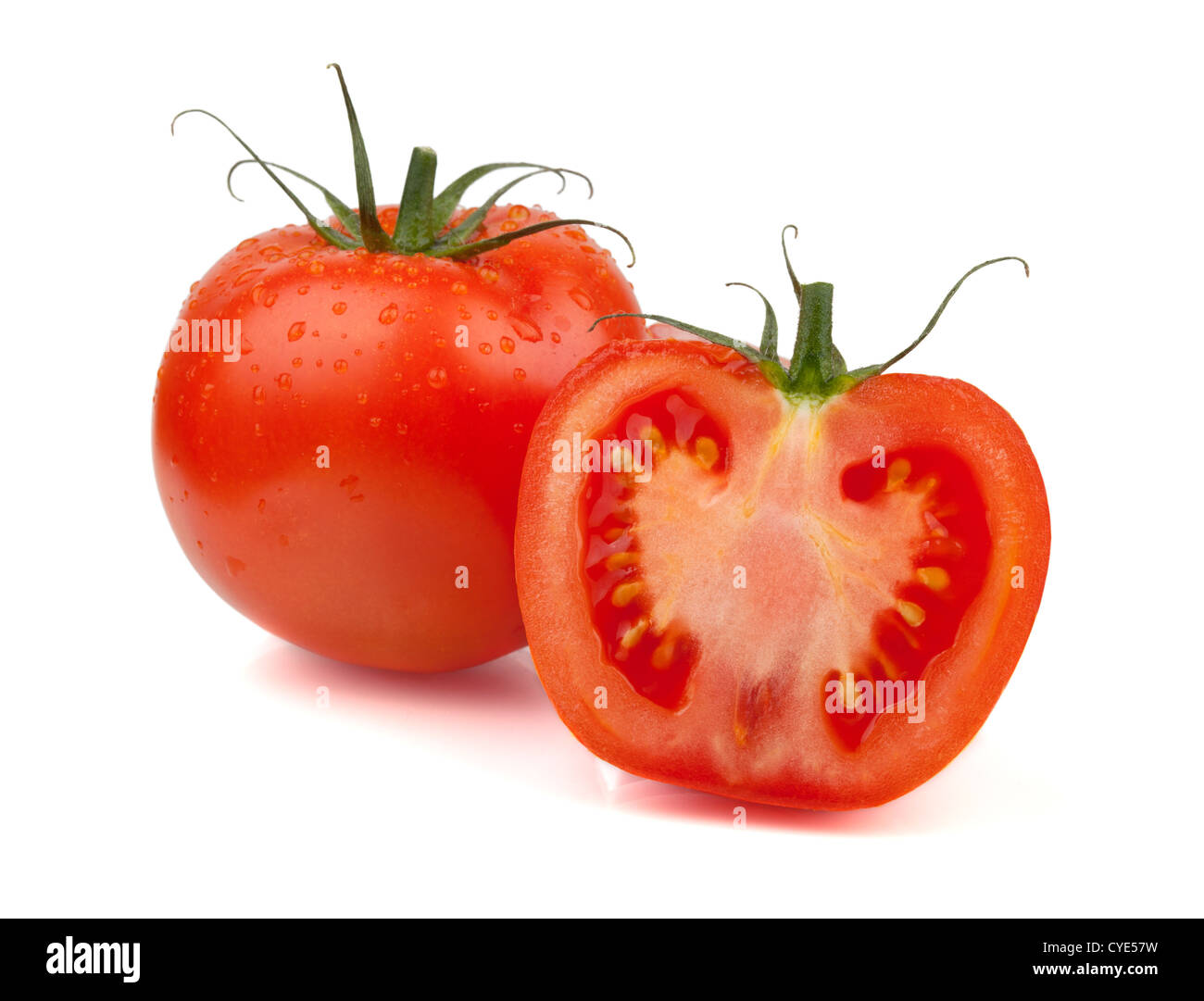 Fresh tomatoes with water drops. Isolated on white background Stock ...