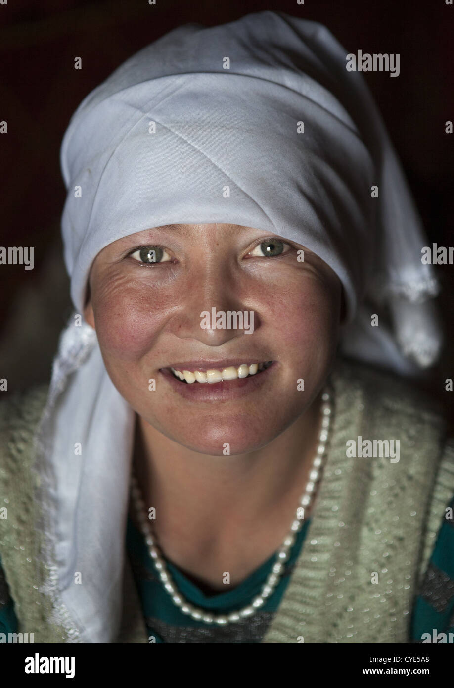 Smiling Kyrgyz Woman Near Karakul Lake, Xinjiang Uyghur Autonomous Region, China Stock Photo