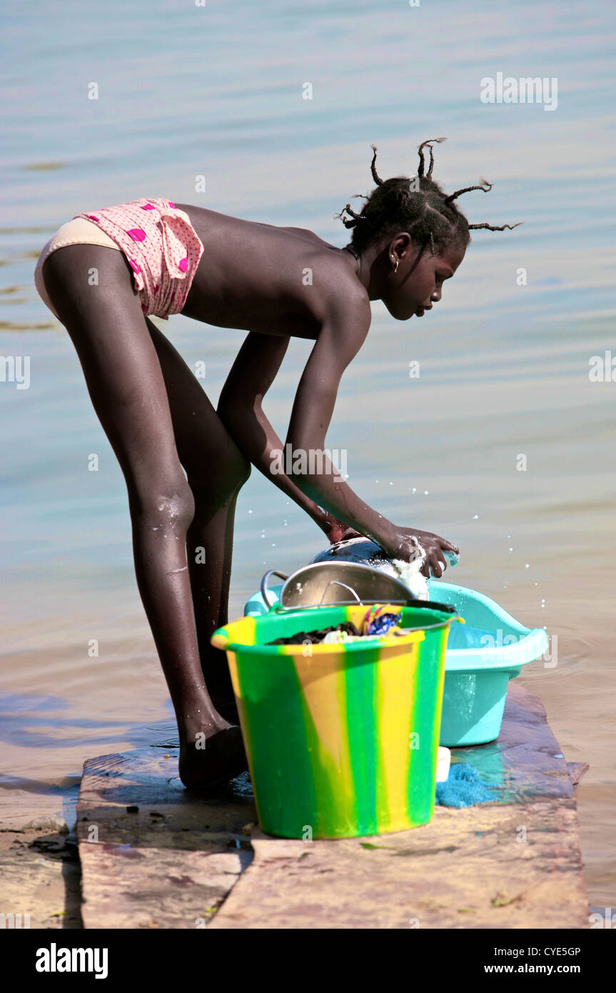 Washing in the Niger River. Stock Photo