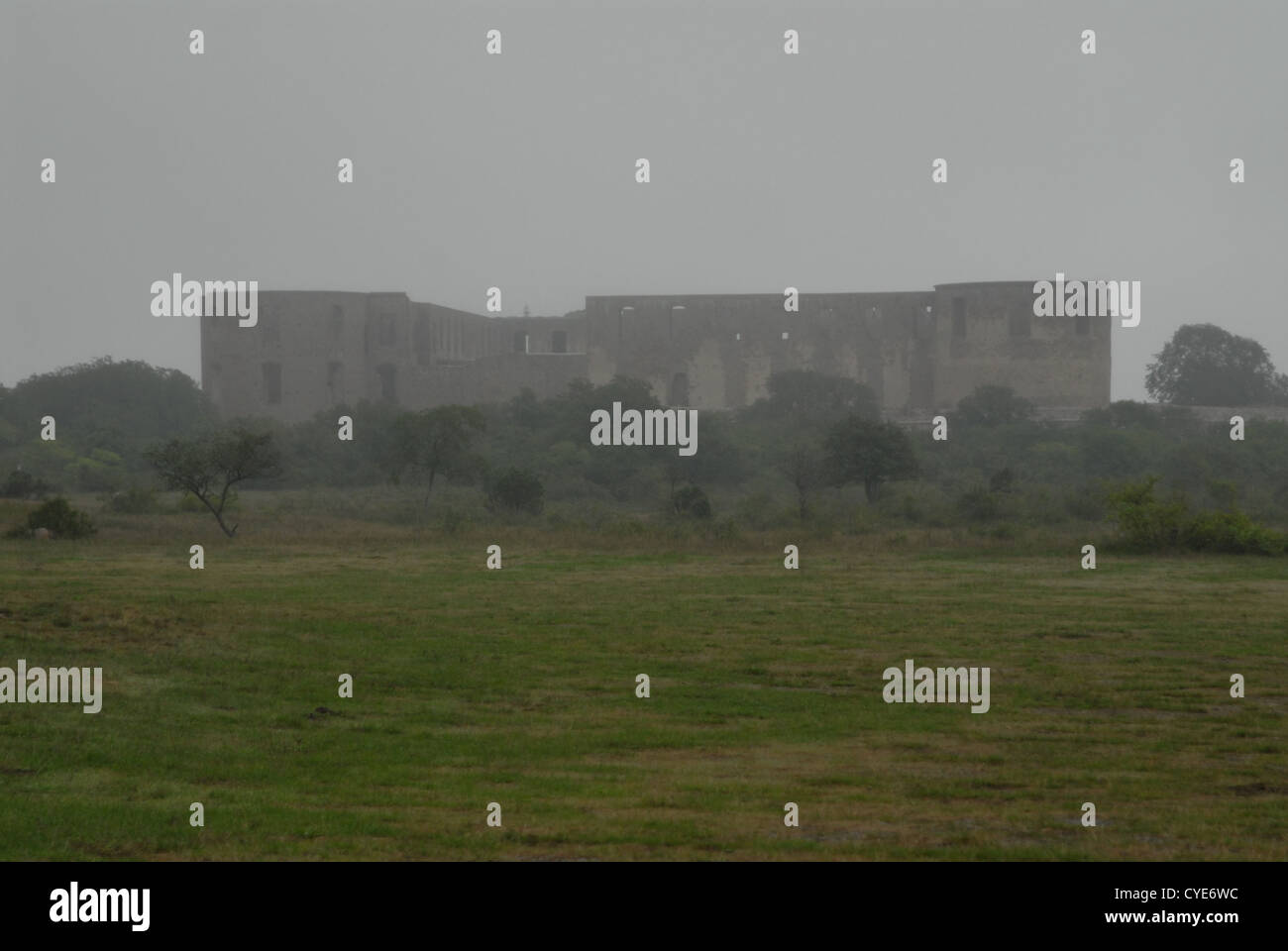 Castle ruin in bad weather. Stock Photo