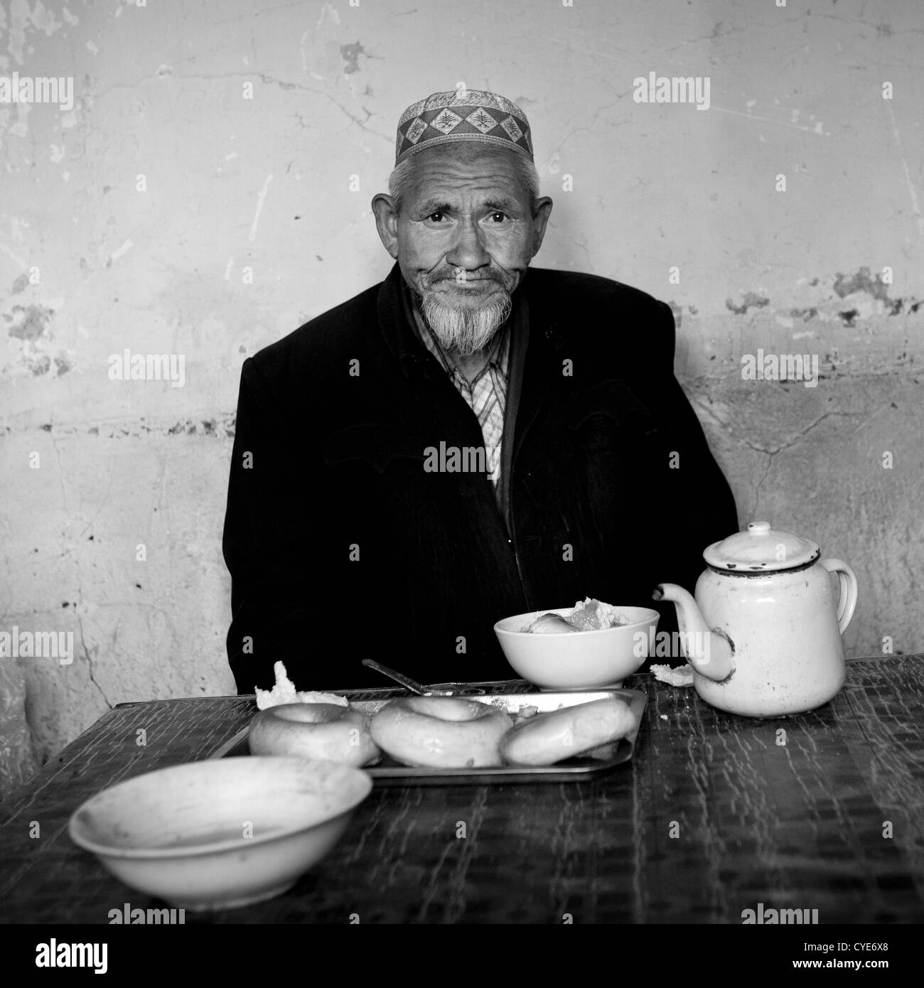 Uyghur Man In Ostangboyi Tea House, Kashgar, Xinjiang Uyghur Autonomous Region, China Stock Photo