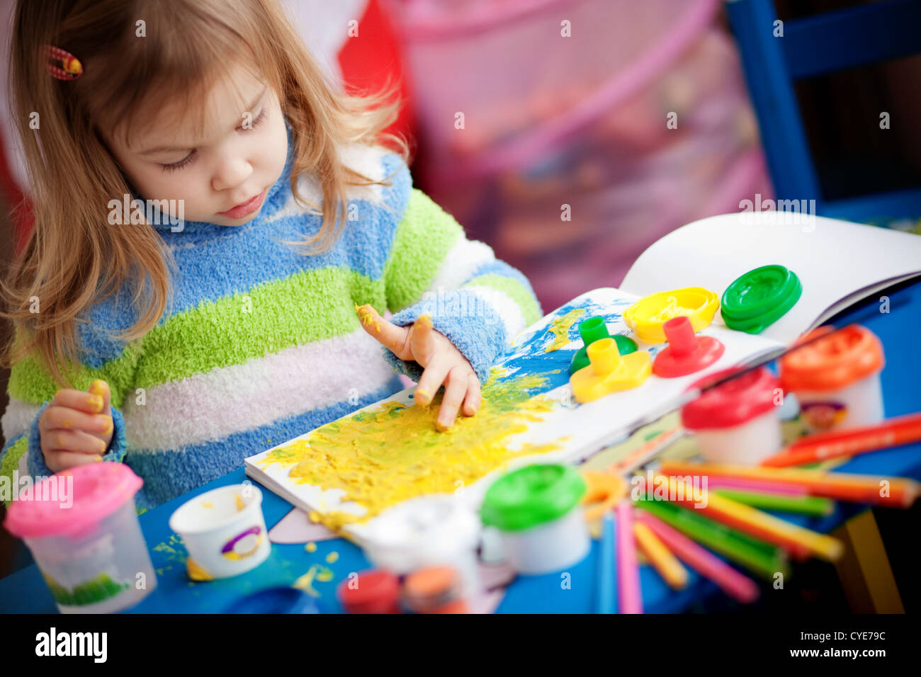 Little girl painting Stock Photo Alamy