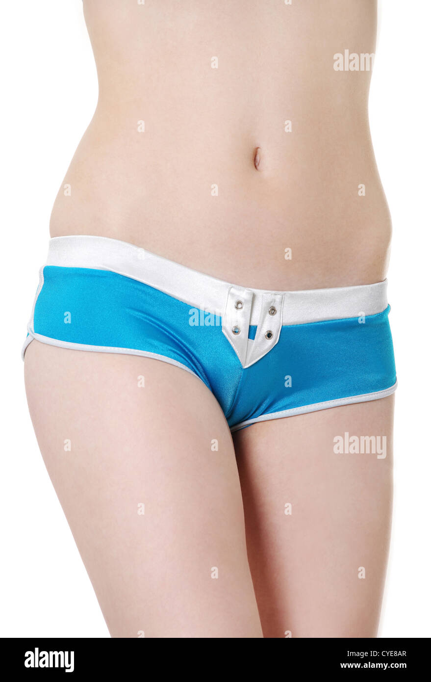 Front view of a fit and young girl dressed in blue underwear, isolated on a  white background Stock Photo - Alamy