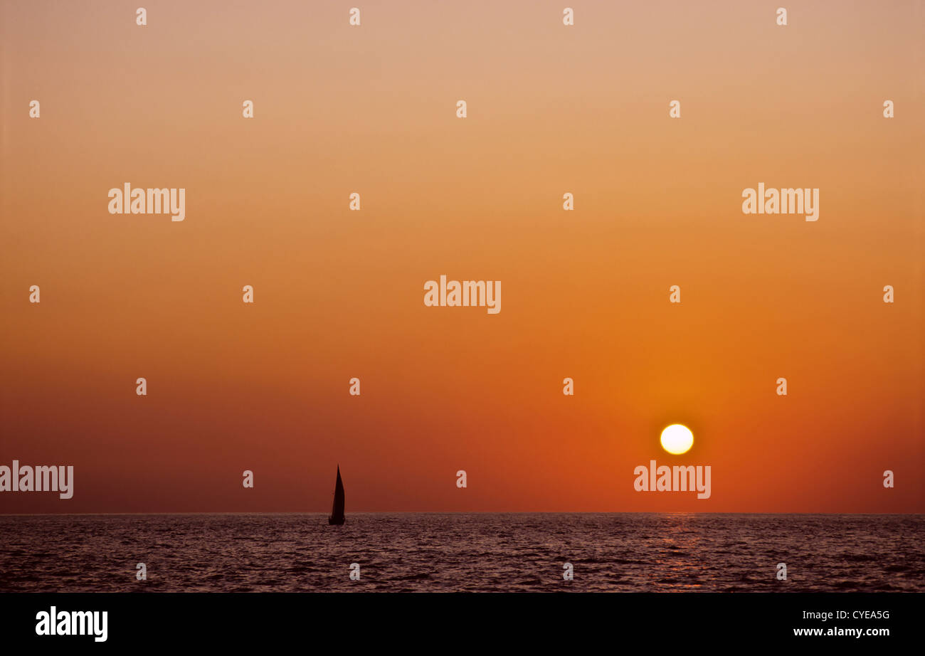 Sailing boat at sunset hi-res stock photography and images - Alamy