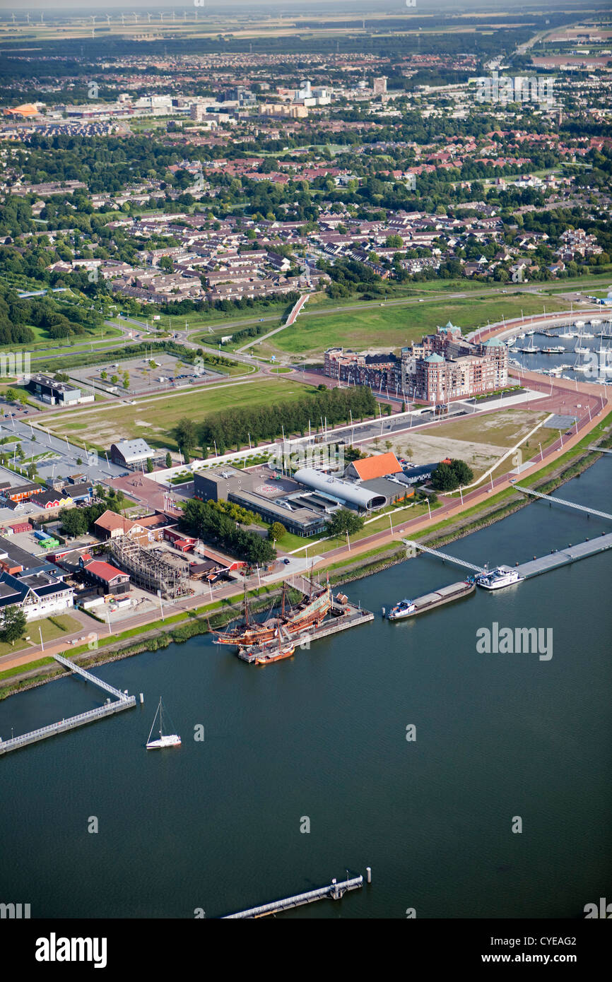 The Netherlands, Lelystad, Batavia Wharf, including replica of VOC ship Batavia. Aerial. Stock Photo
