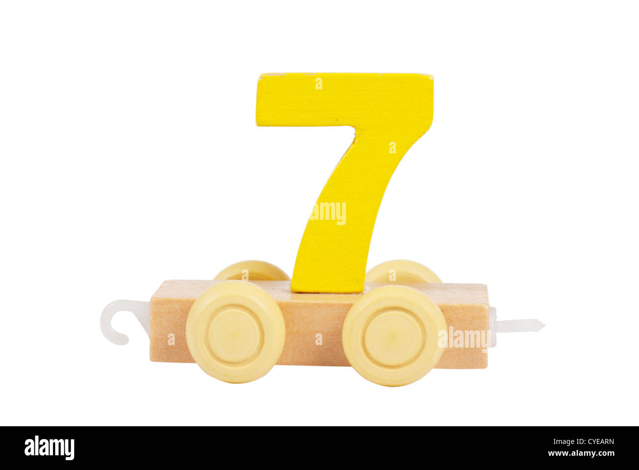 Wooden toy on a wheels number 7 isolated over white Stock Photo