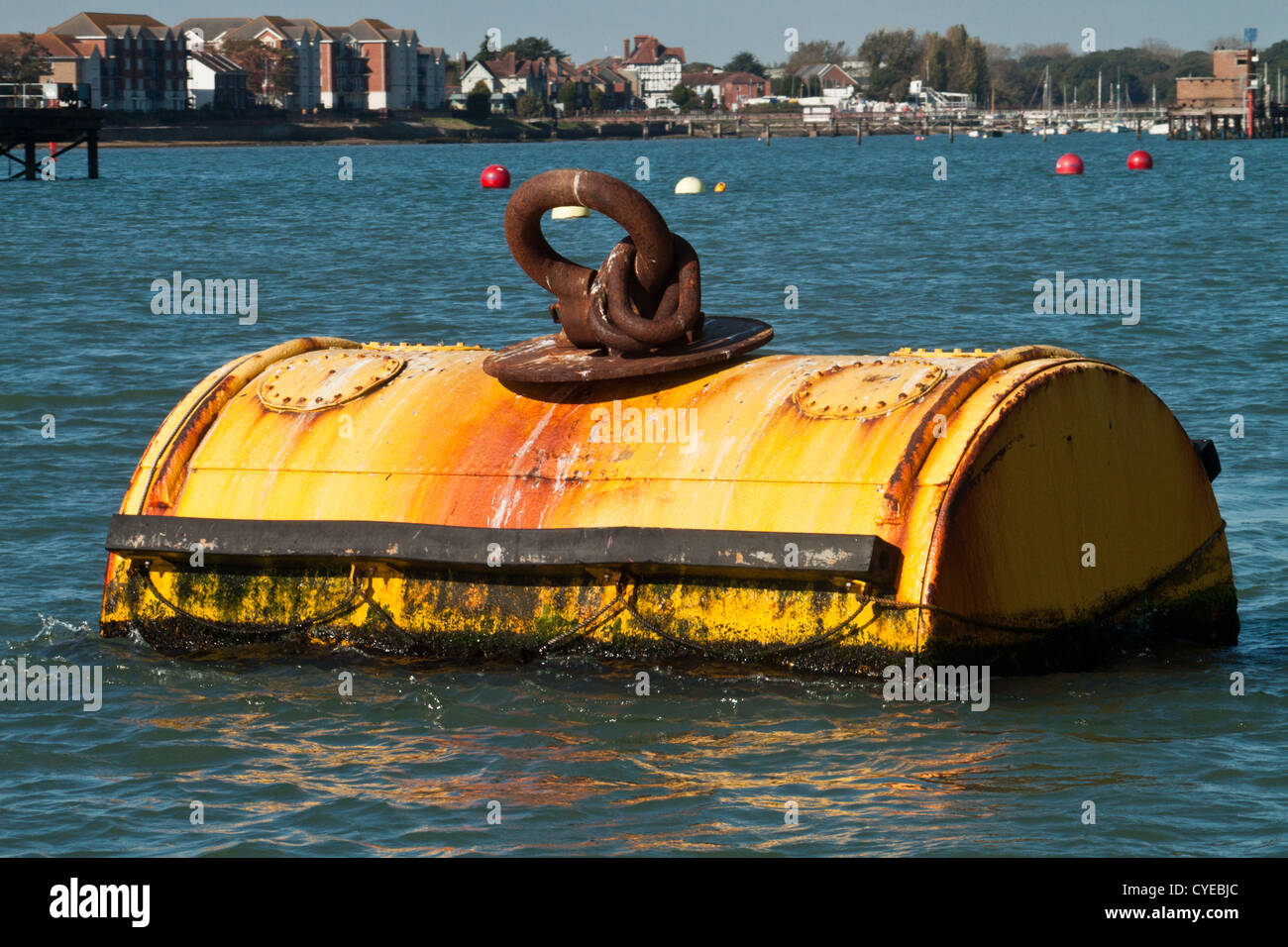 A yellow mooring buoy in Portsmouth water offering a safe mooring for