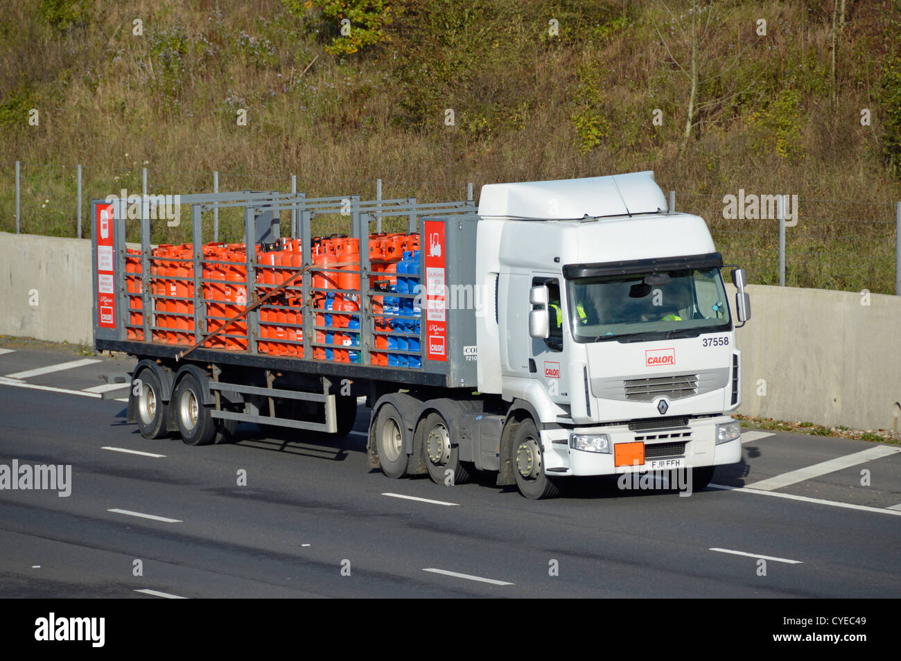 Calor lorry with trailer loaded with butane and propane gas bottles Stock Photo