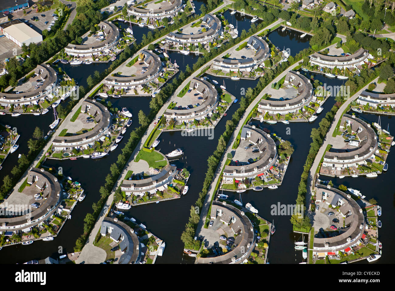 The Netherlands, Lemmer, Aerial. Holiday houses at waterside. Stock Photo