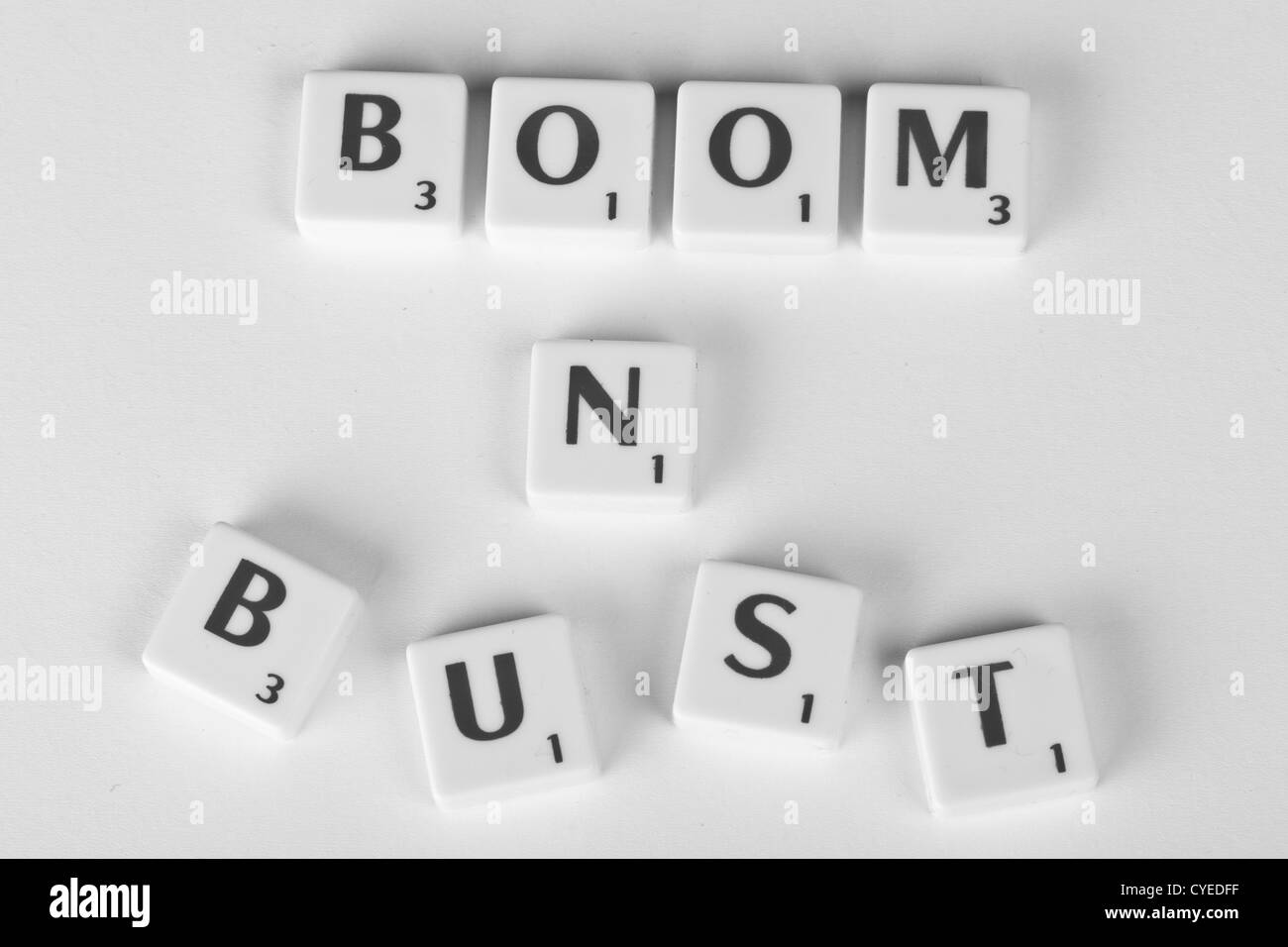 "boom n bust" boom and bust, symbolic symbolizes economic peaks and troughs which ebb and flow repeatedly,world economic turmoil Stock Photo