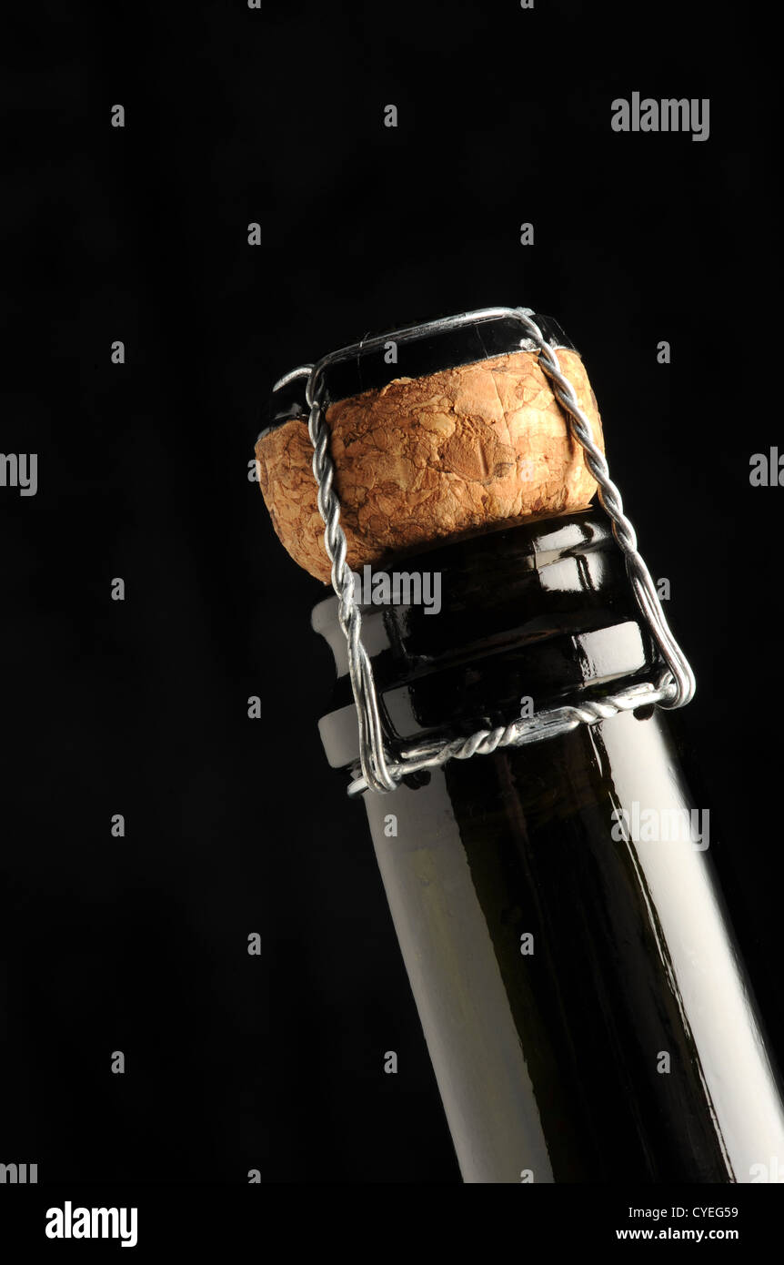 sparkling wine cap on black background Stock Photo - Alamy