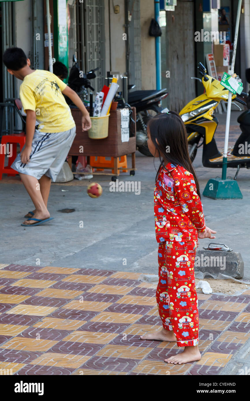 Children playing in the Street in Phnom Penh, Cambodia Stock Photo - Alamy