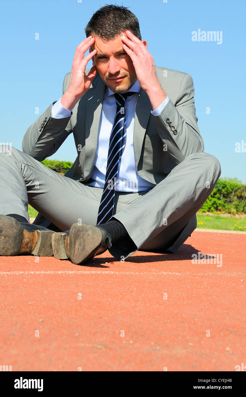 Portrait of a businessman loose racing Stock Photo - Alamy