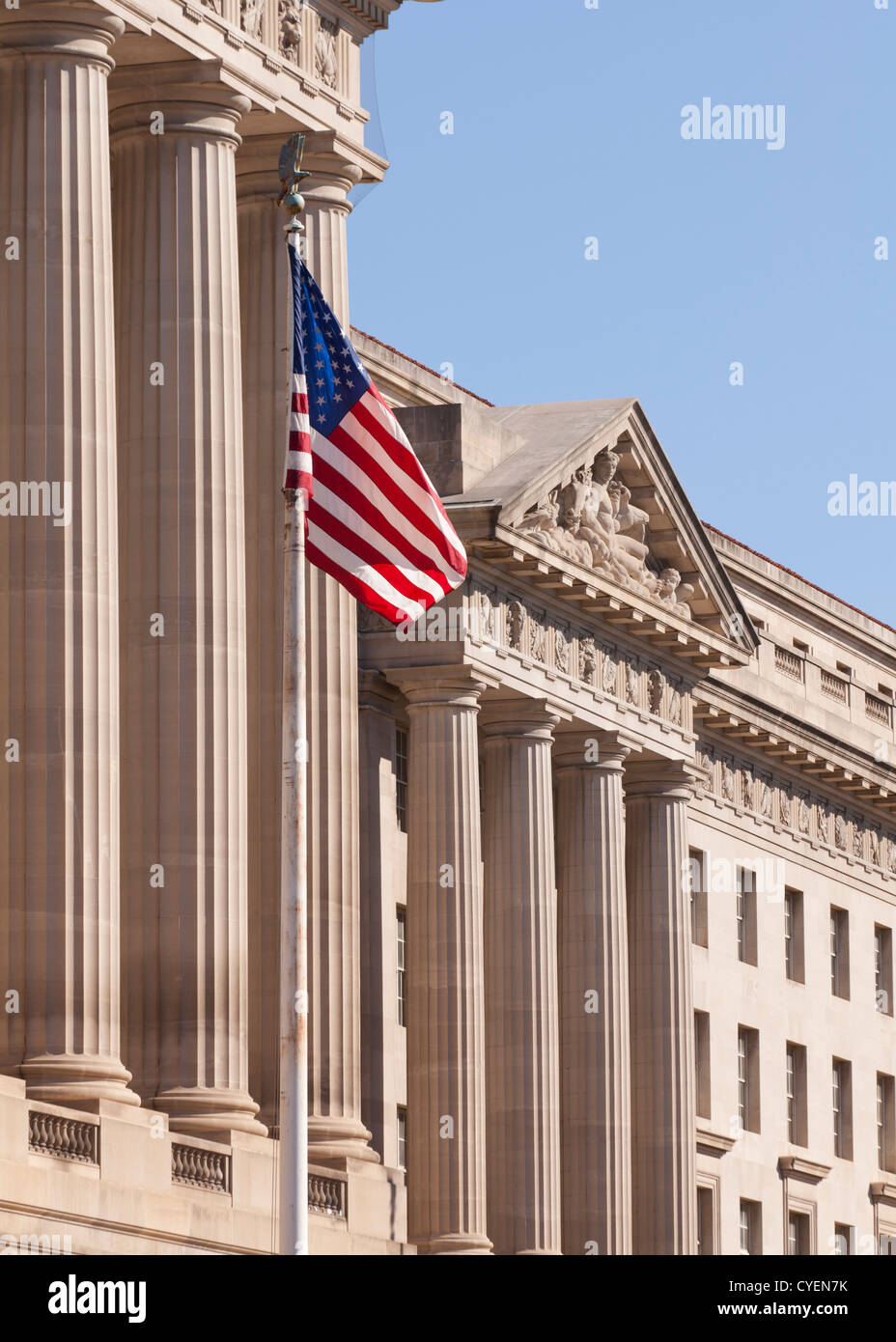 American flag in front of US government building - USA Stock Photo