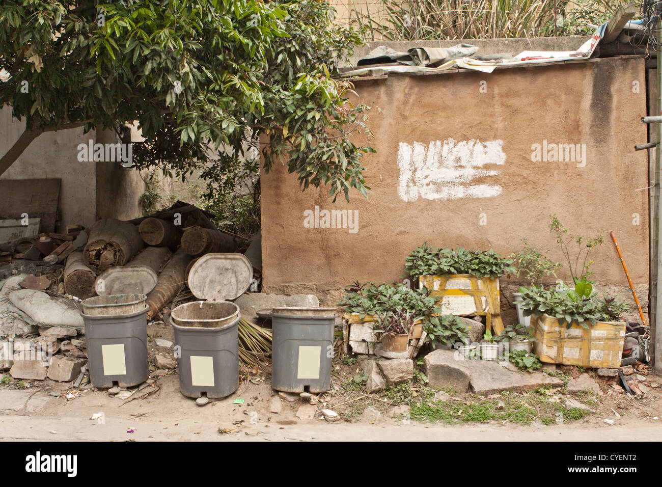 Chinese village with houses and rubbish bins Stock Photo Alamy