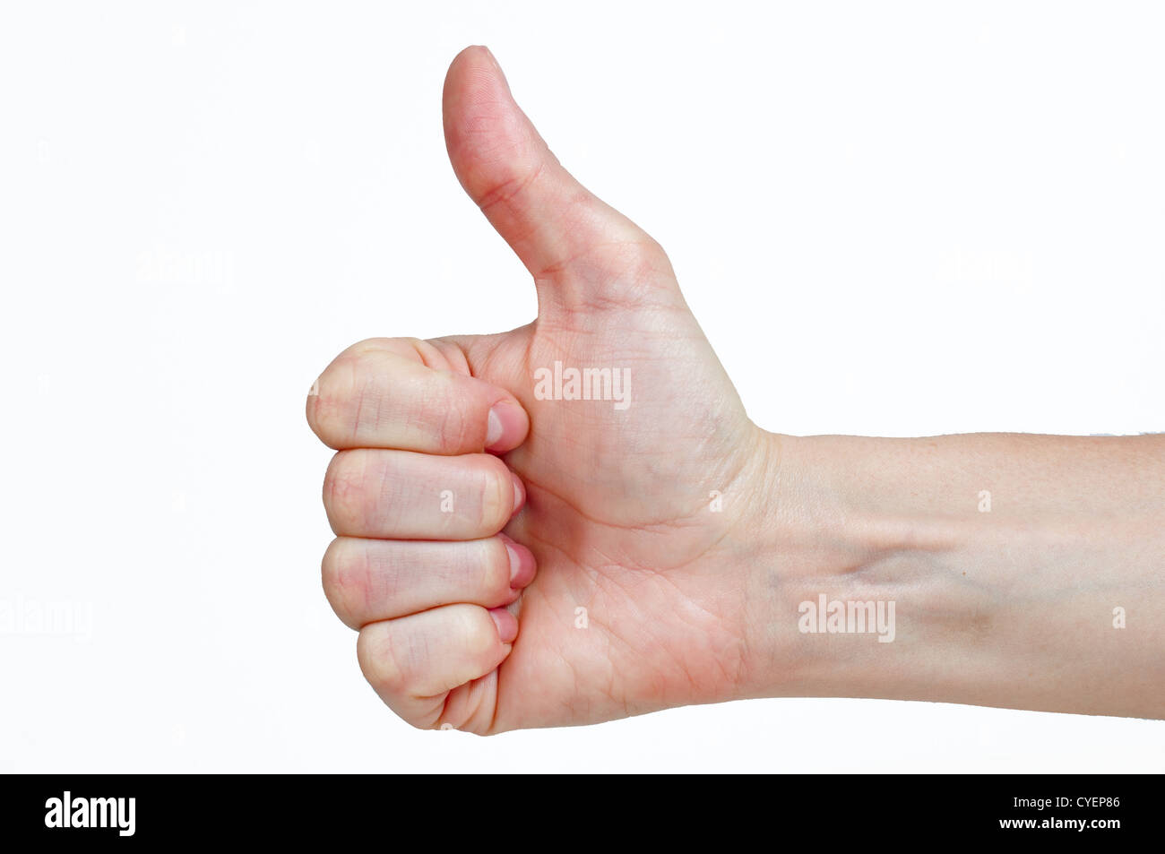 Woman's hand make thumbs up isolated over white Stock Photo
