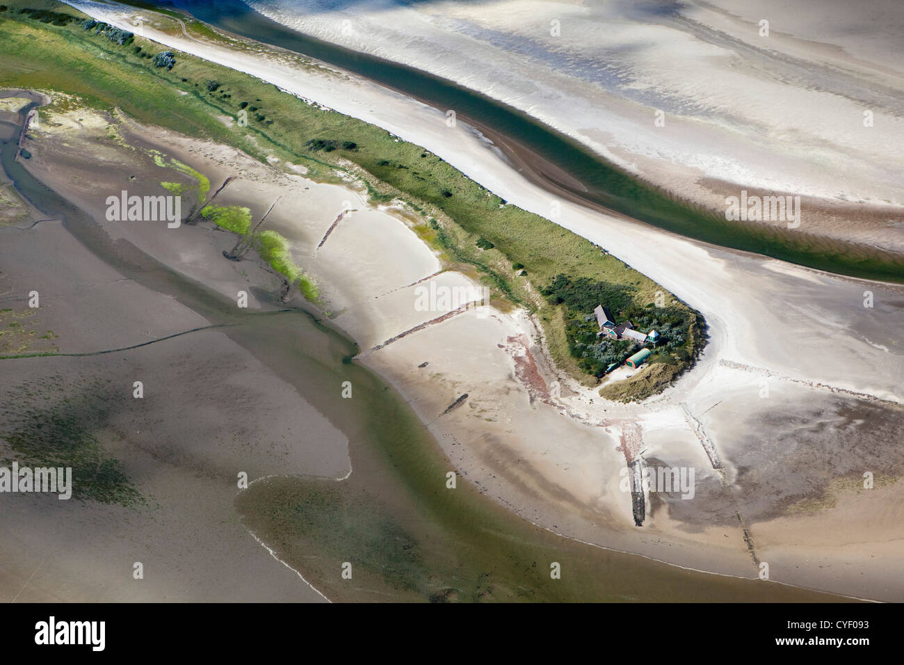 Island called Rottumerplaat. Part of the Wadden Sea islands. UNESCO World Heritage Site. Marsh land, mud flats. Aerial. Stock Photo