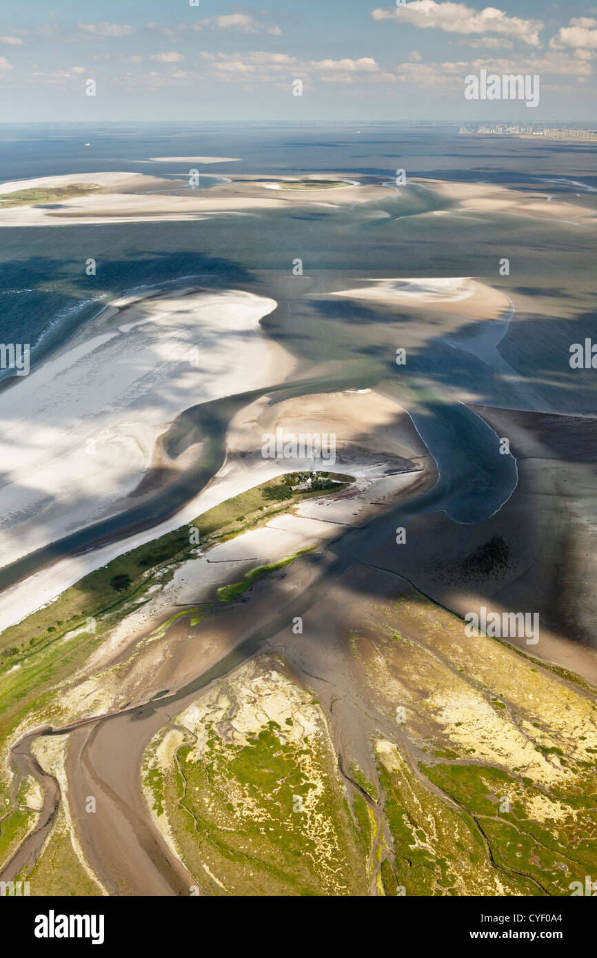 Island called Rottumerplaat. Part of the Wadden Sea islands. UNESCO World Heritage Site. Marsh land, mud flats. Aerial. Stock Photo