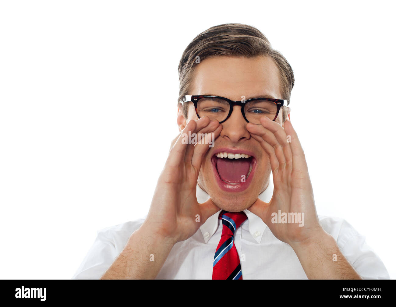 Excited young man excited shouting with glasses on against white