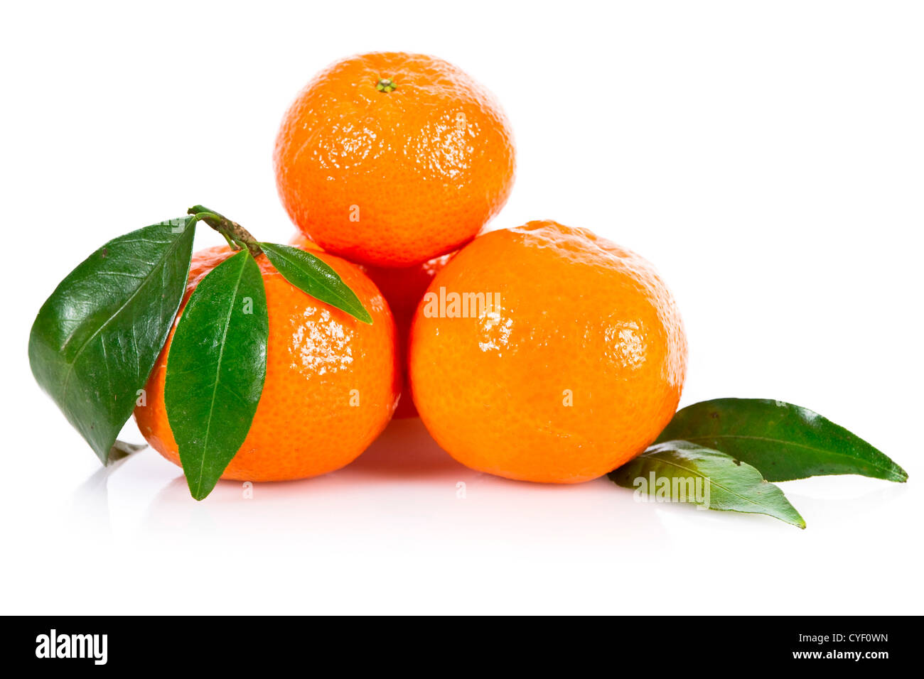 Mandarine fruits with leaves isolated over white Stock Photo