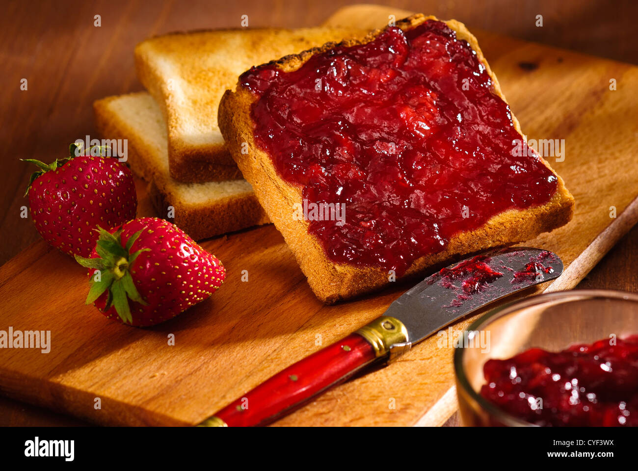 toast snack with cherry jam and strawberry Stock Photo Alamy