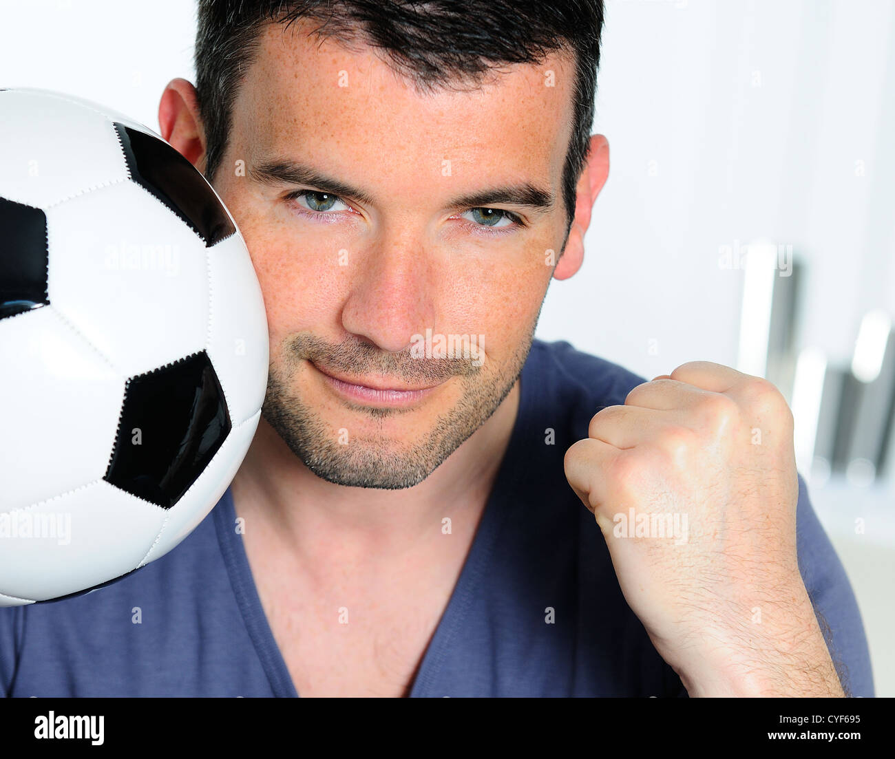 closeup of passionate soccer fan with white and black balloon Stock Photo Alamy