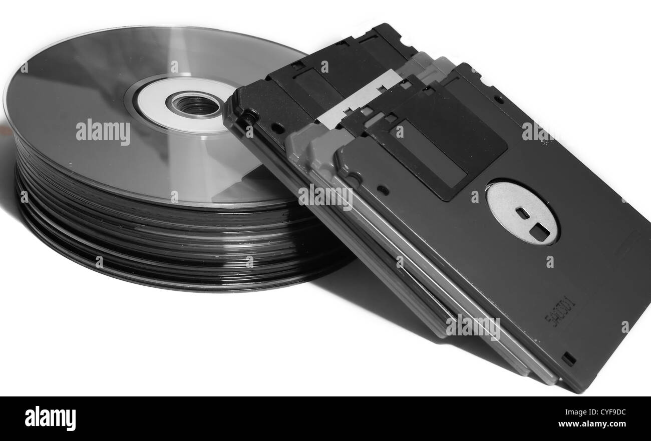 CD with diskettes on white background Stock Photo Alamy
