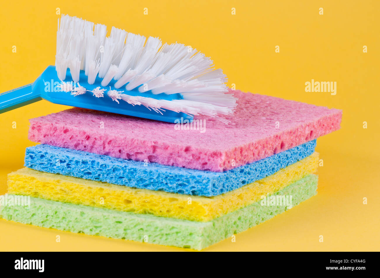 https://c8.alamy.com/comp/CYFA4G/kitchen-brush-and-multi-color-sponges-for-cleaning-CYFA4G.jpg