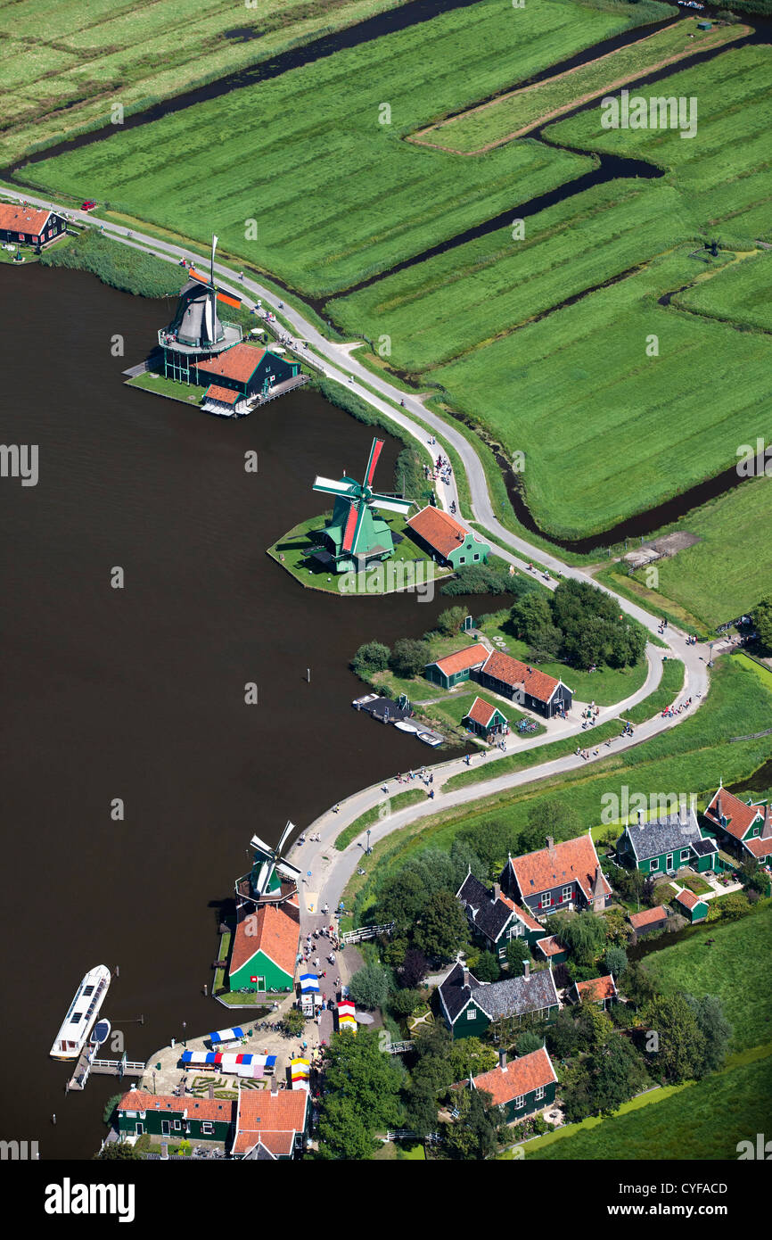 The Netherlands, Zaanse Schans. The outdoor museum has a collection of well-preserved historic windmills and houses. Aerial. Stock Photo