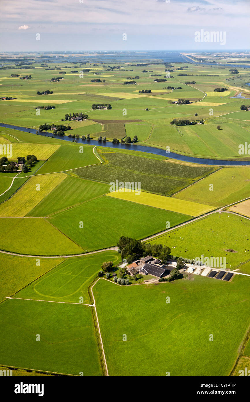 The Netherlands, Ijsselmuiden, Farms and farmland. Aerial. Stock Photo