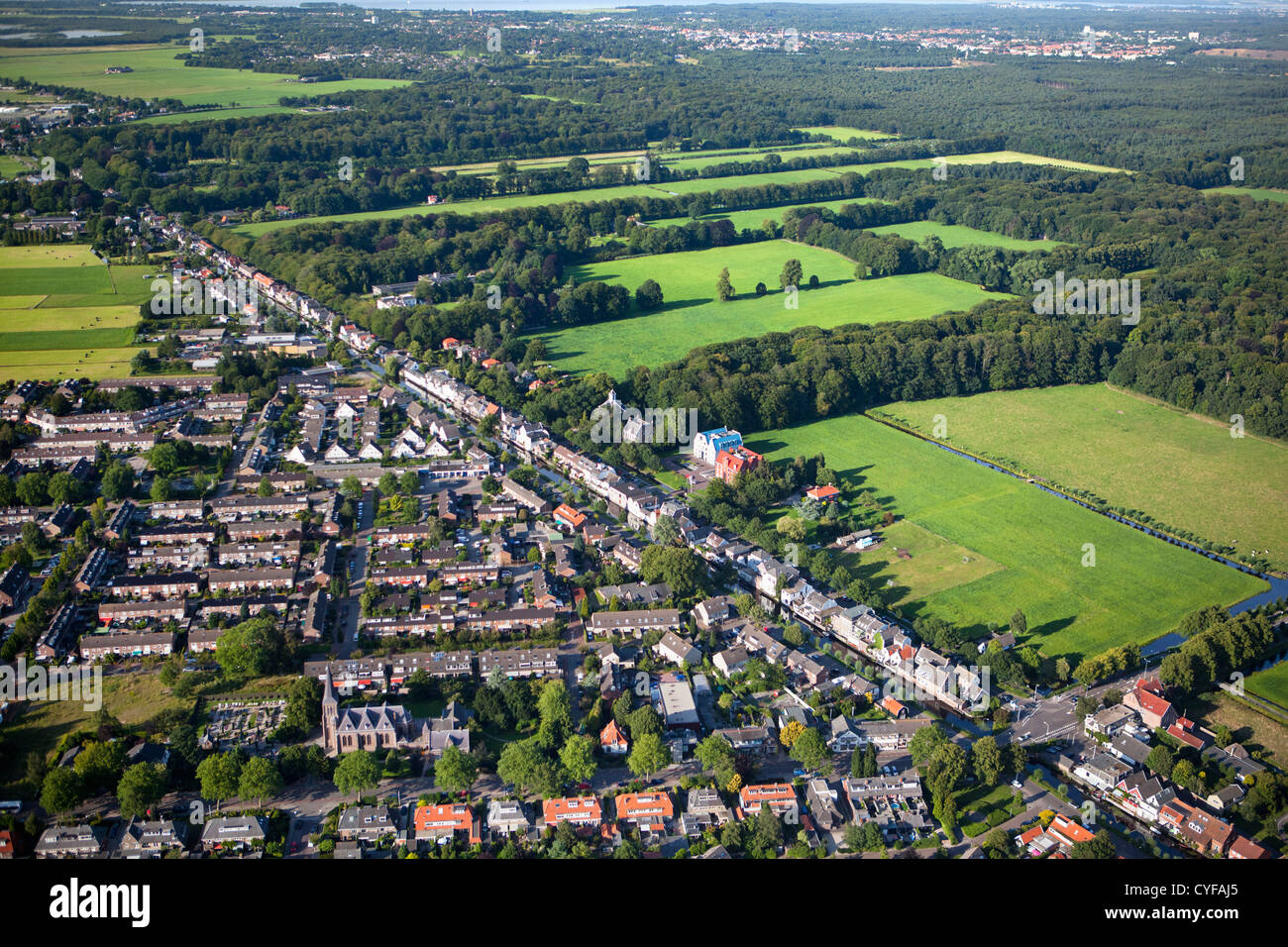 Foreground view on village called Kortenhoef, background the northern part of  the rural estate areas of 'S-Graveland. Aerial. Stock Photo