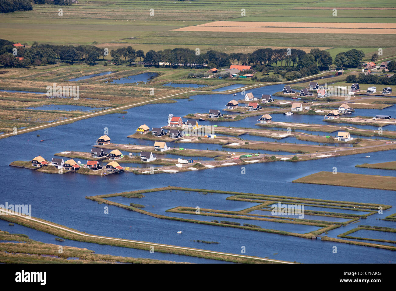 The Netherlands, Giethoorn, Project for holiday houses. Under construction. Aerial. Stock Photo