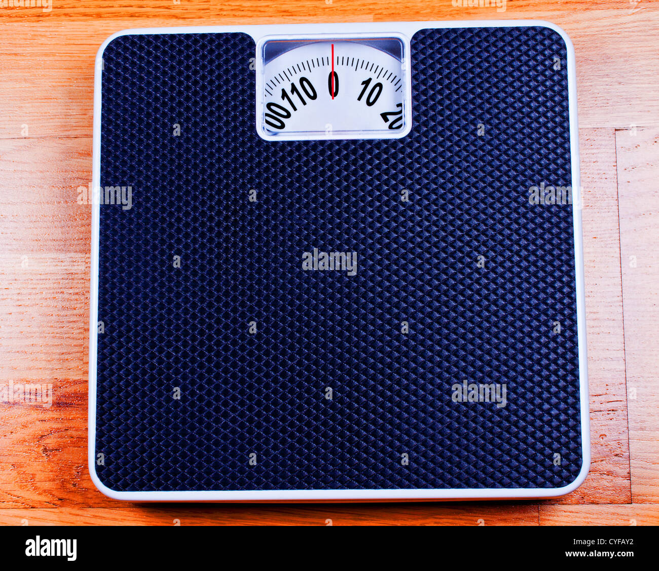 Bathroom Scale close up on plywood Stock Photo