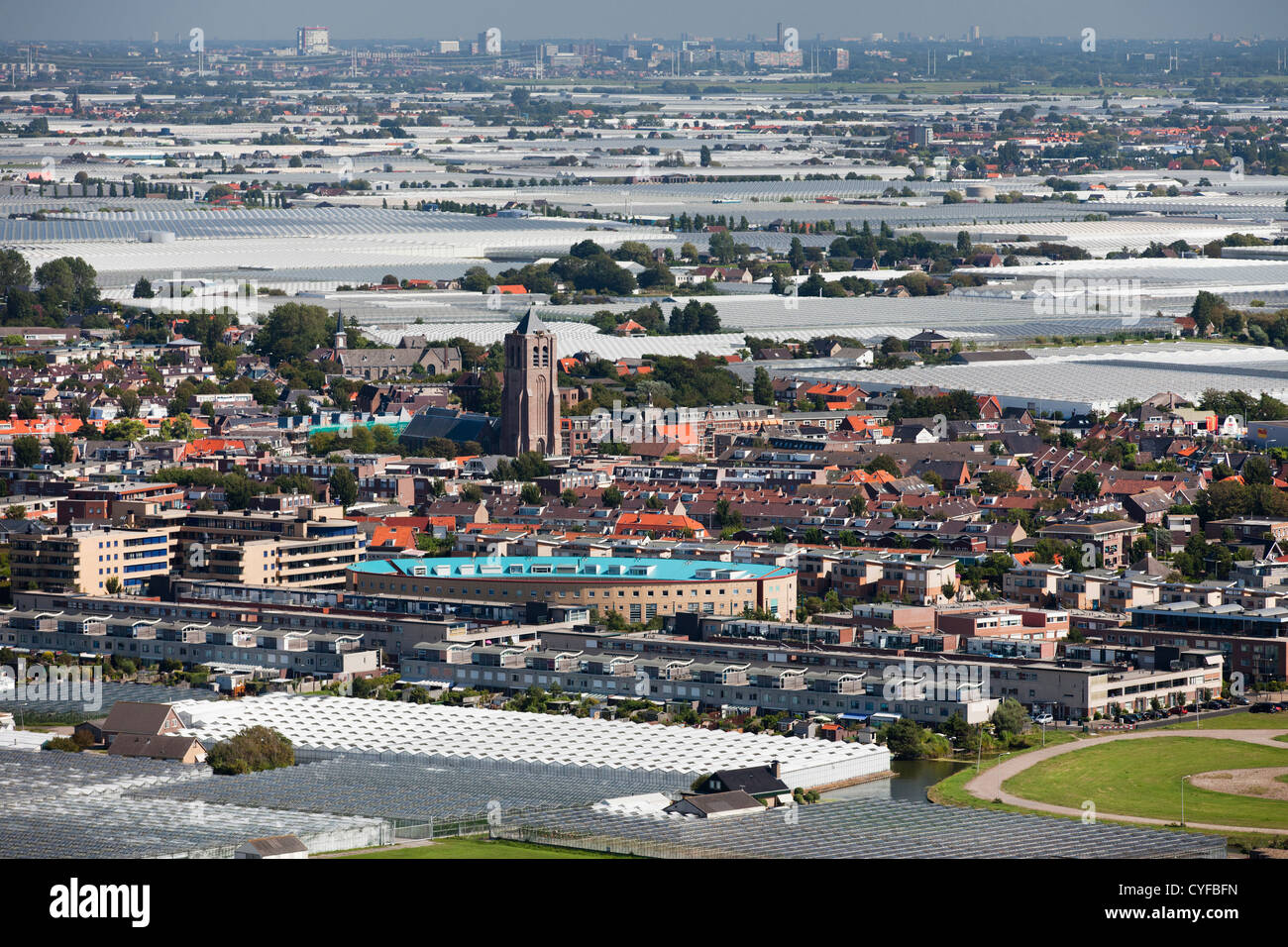 The Netherlands, Monster. View on village and glass houses. Aerial