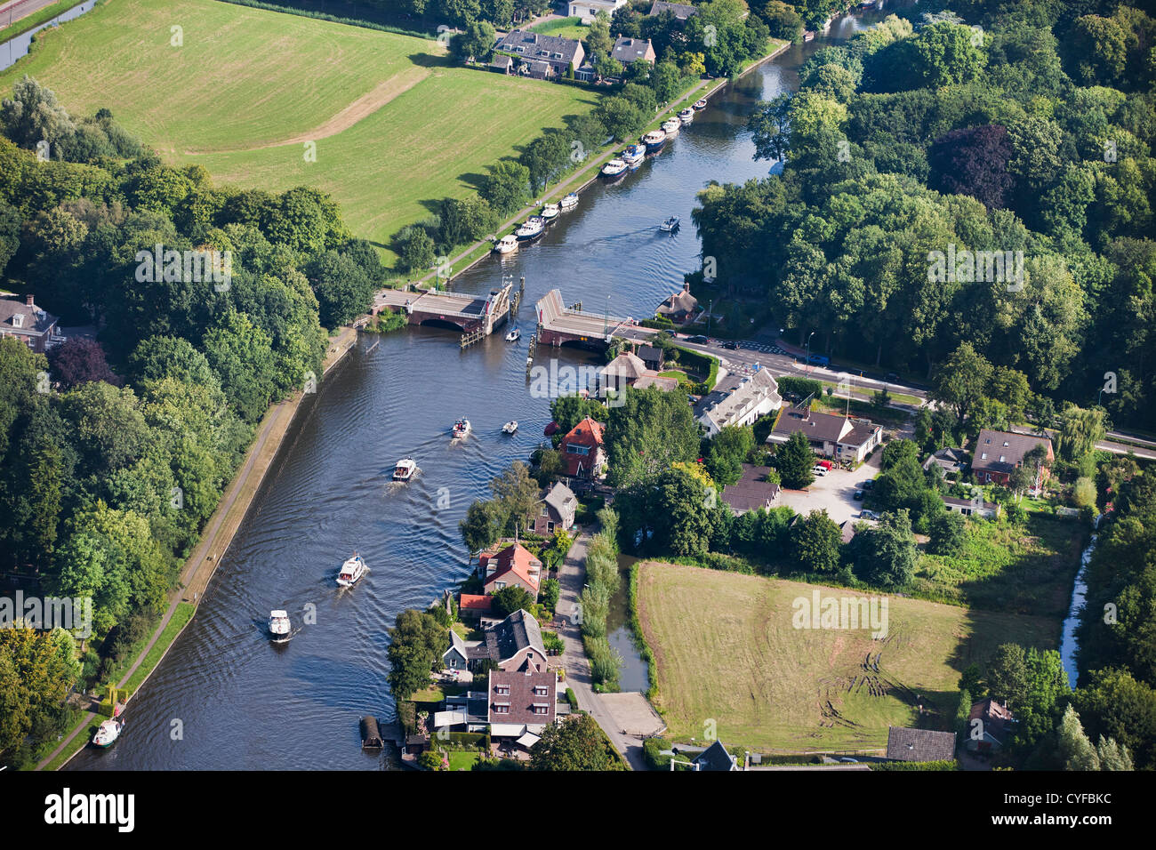 The Netherlands, Vreeland. River Vecht. Boats passing drawbridge. Aerial. Stock Photo