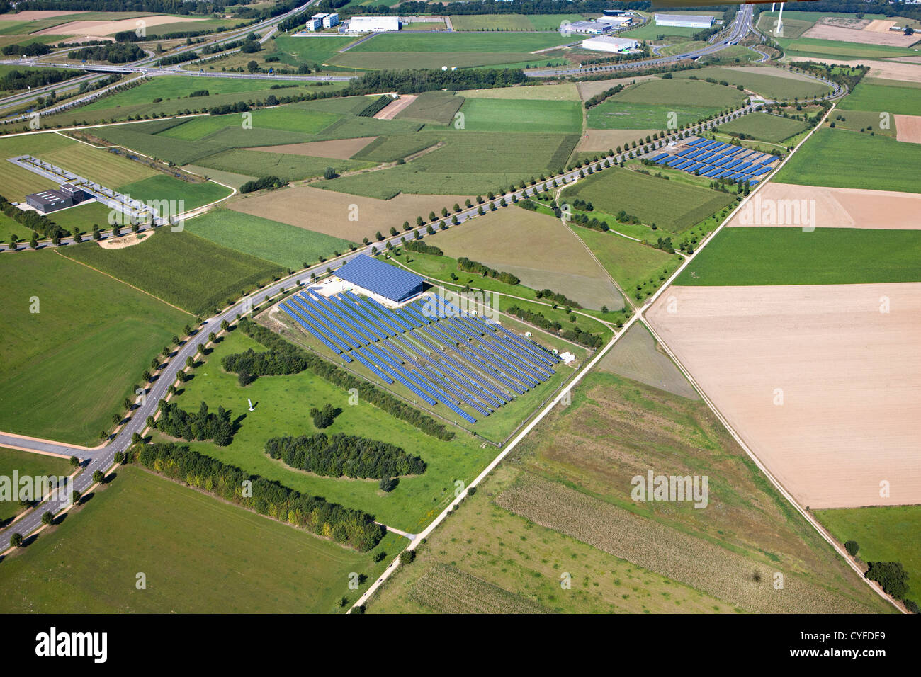 The Netherlands, Heerlen, Industrial solar panel field. Aerial. Stock Photo