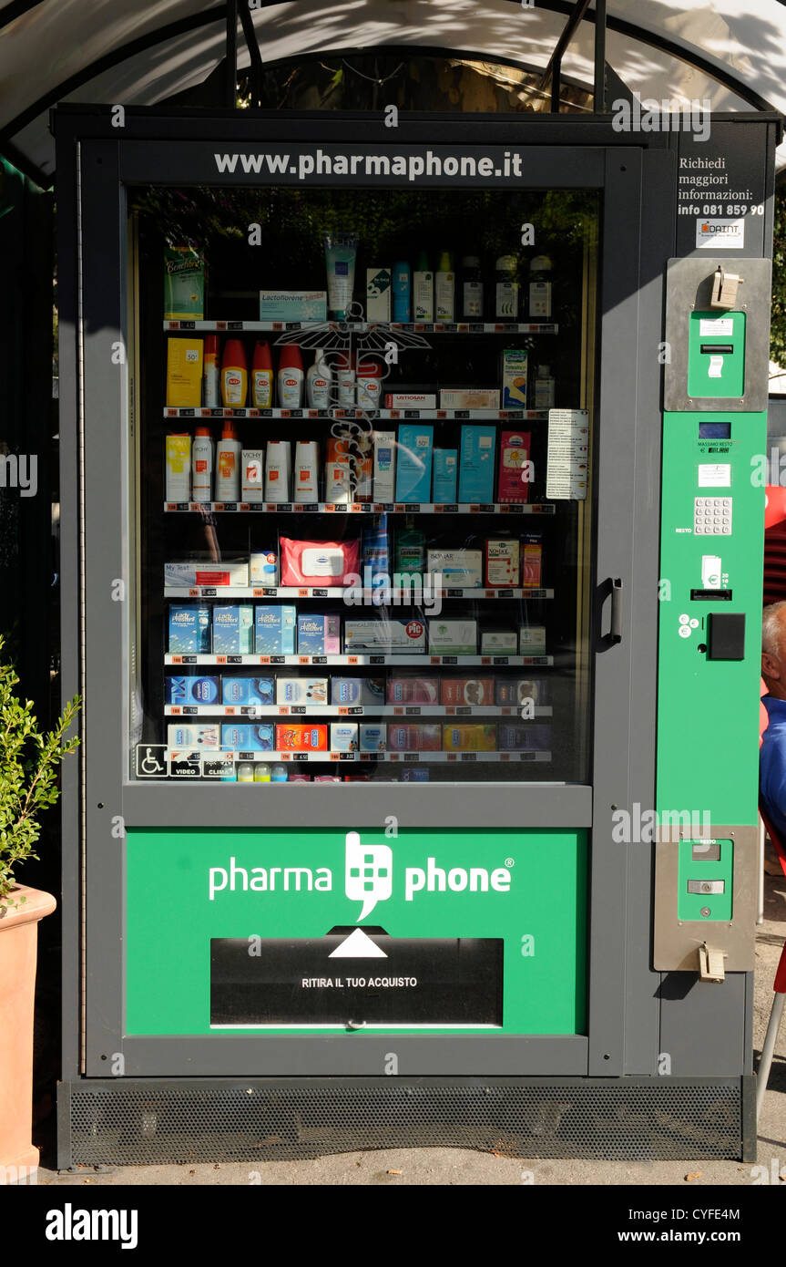 Pharmacy vending machine in Italy, includes family planning items such as condoms. Stock Photo