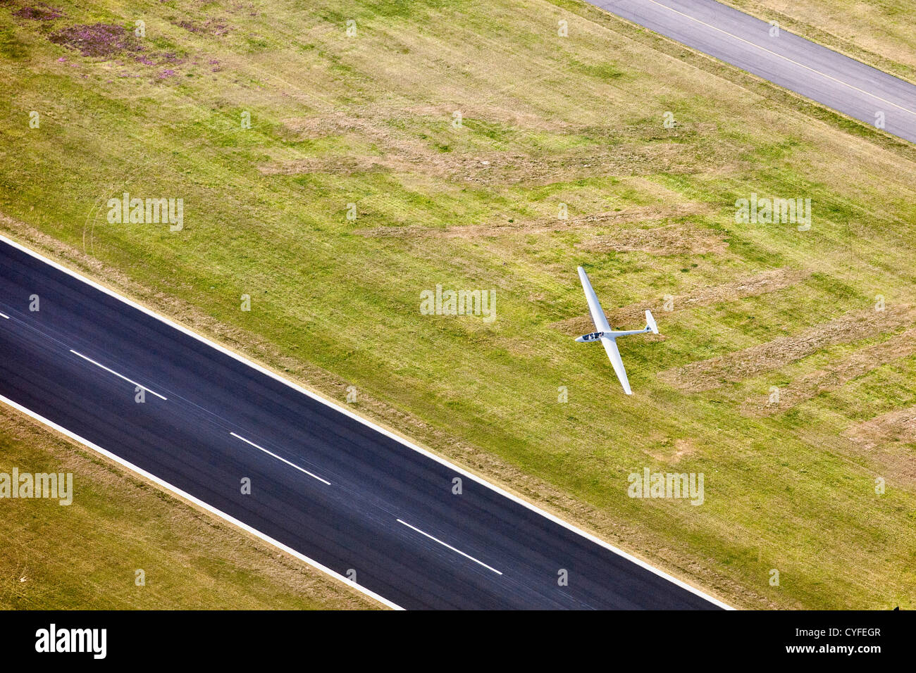 The Netherlands, Hoogerheide, Airport Woensdrecht. Glider passing airstrip. Aerial. Stock Photo