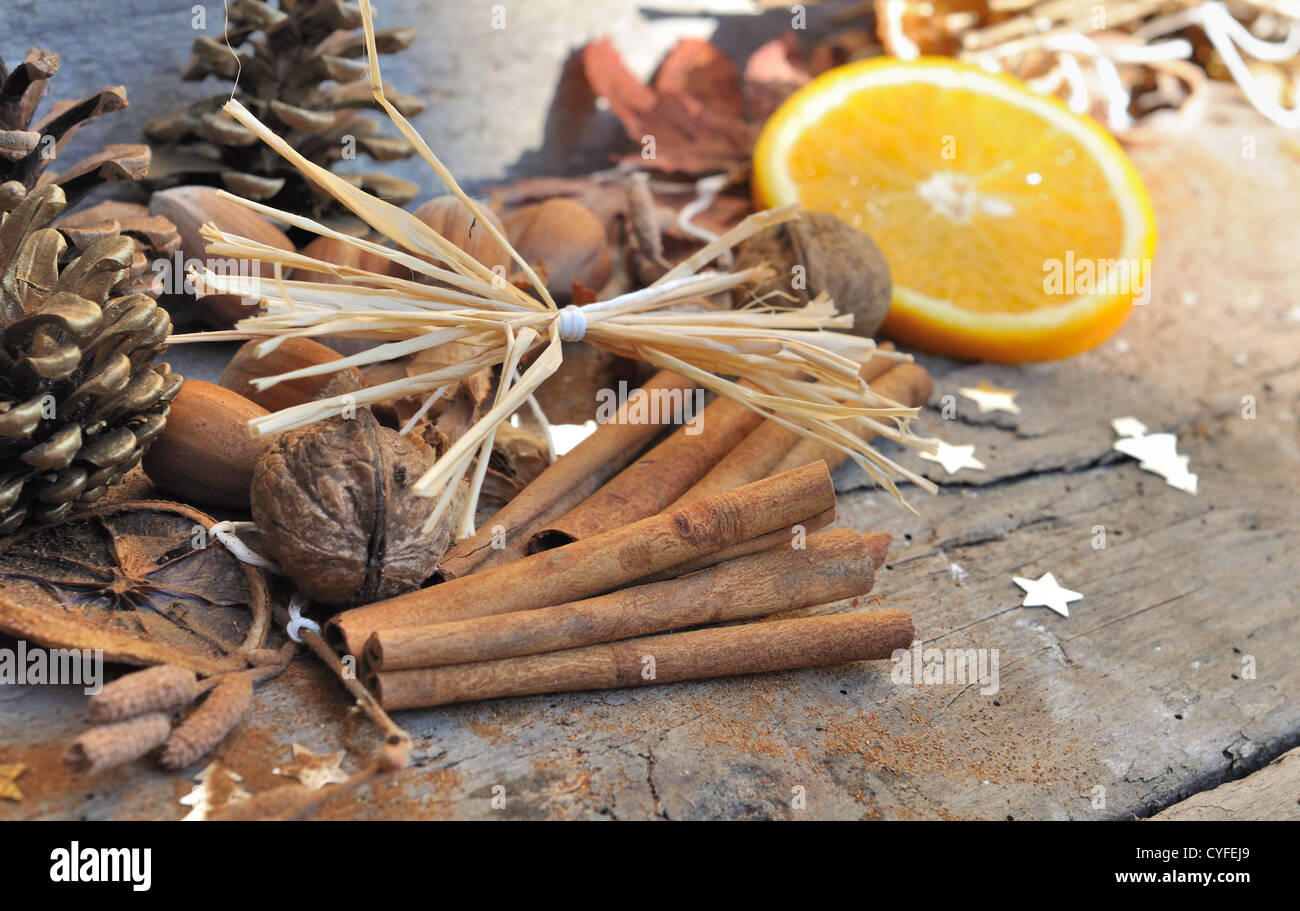 slice of orange with cinnamon in a christmas decoration Stock Photo
