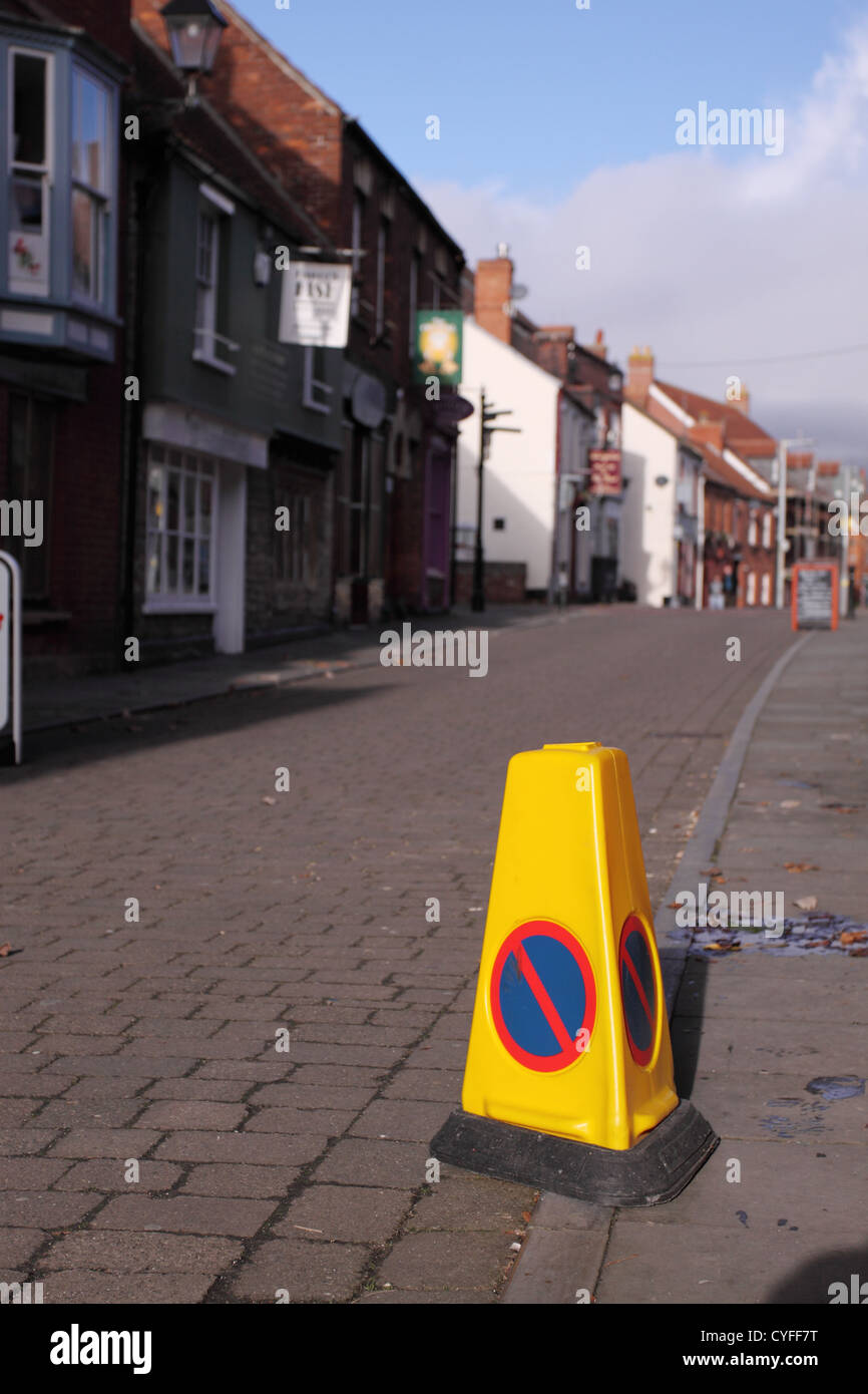 No Waiting sign on traffic cone in an town urban area UK Stock Photo