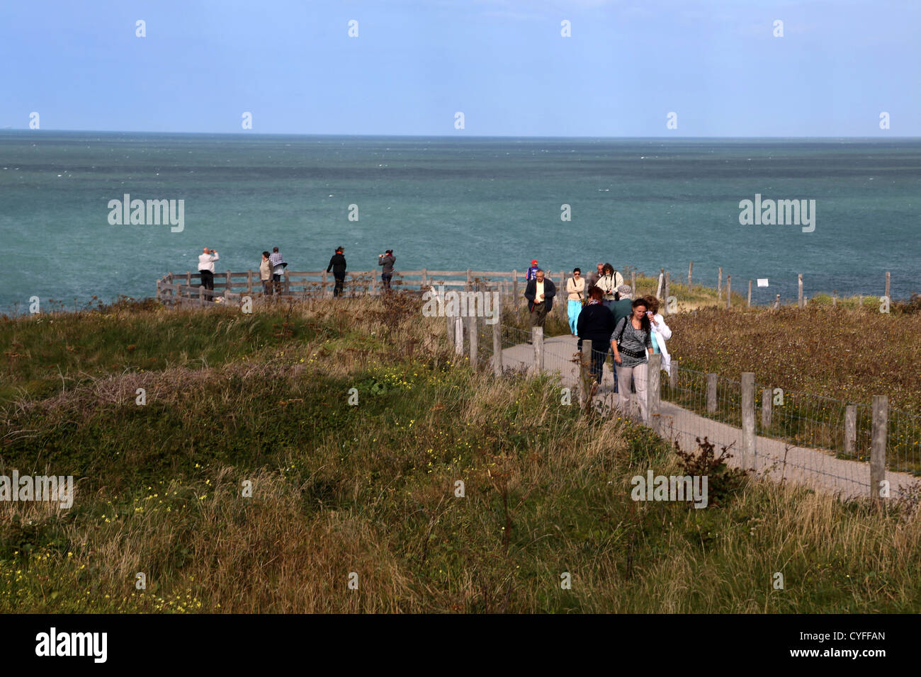Cap Gris Nez Cote d'opale Pas de Calais France People Walking Along Coastal Path To Platform Looking Out To Sea Stock Photo