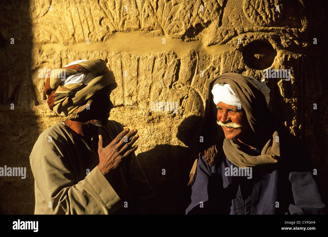 Egypt, Luxor. Guards chatting in Karnak Temple. Stock Photo