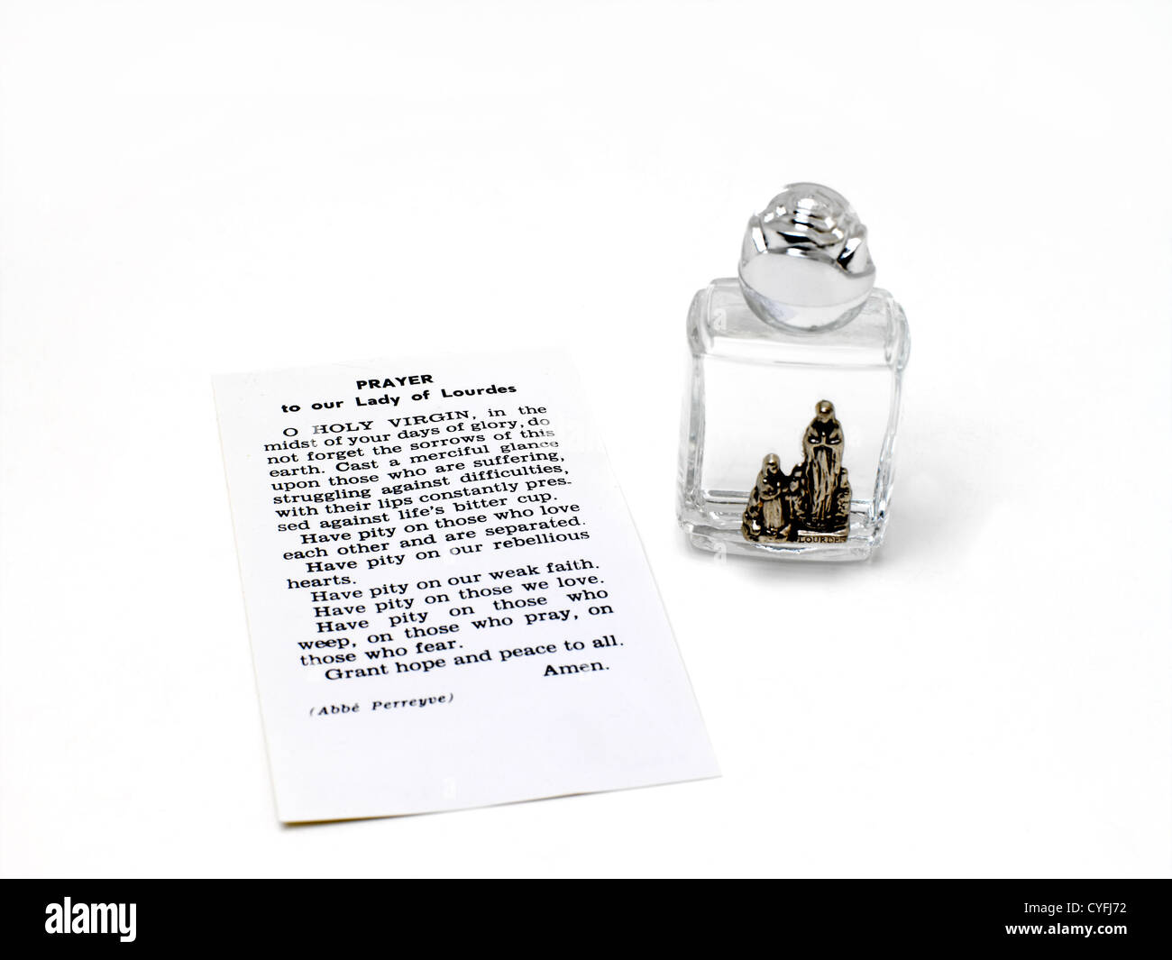 Holy Water from Lourdes with Prayer to Our Lady of Lourdes Stock Photo