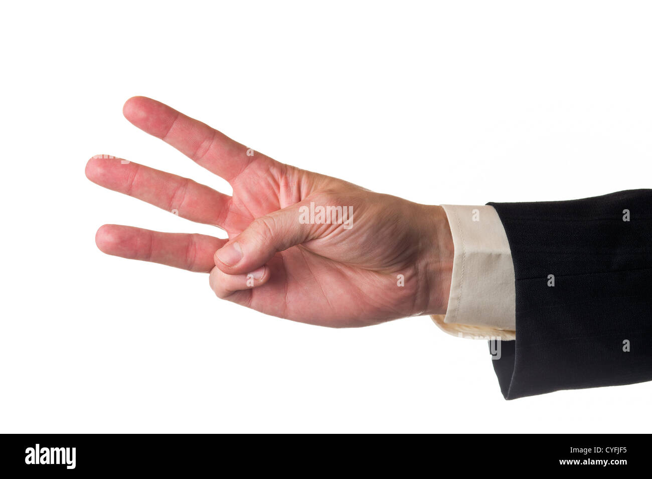 Man showing three fingers, suit sleeve and white isolated background. Stock Photo