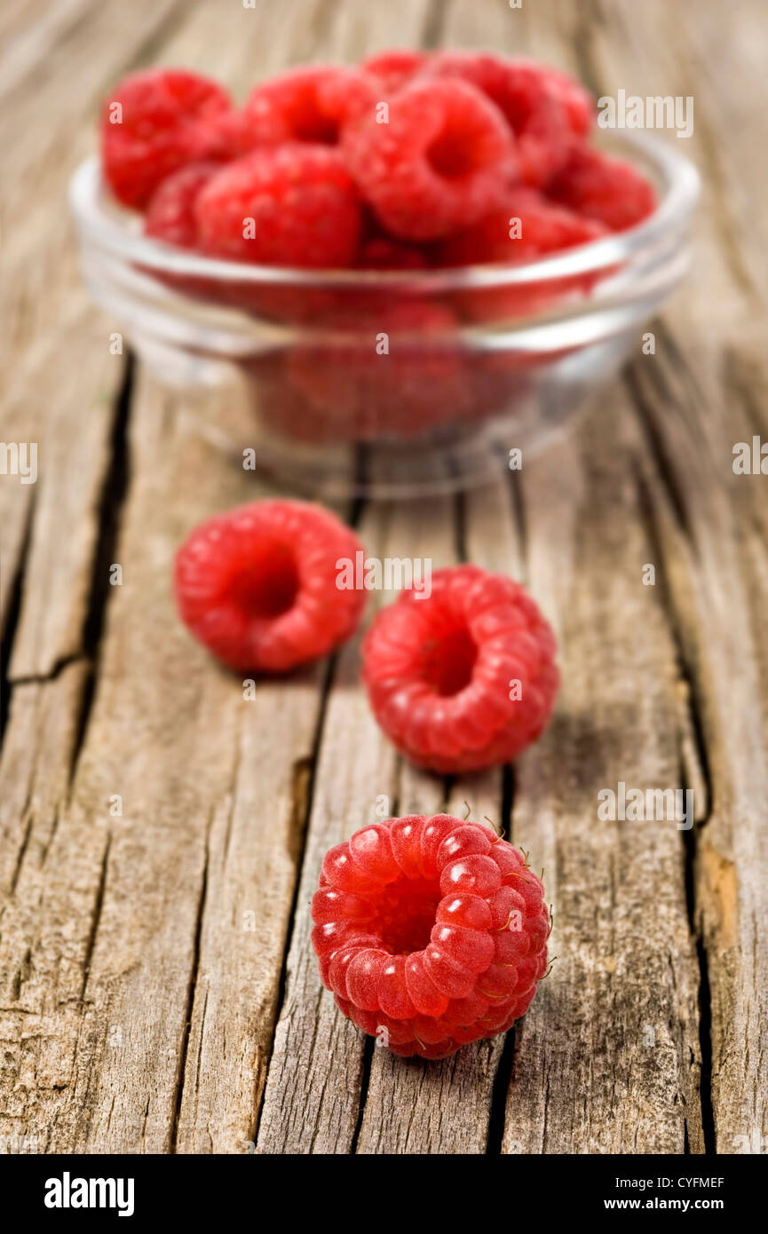 Fresh healthy organic raspberry on wooden background Stock Photo - Alamy