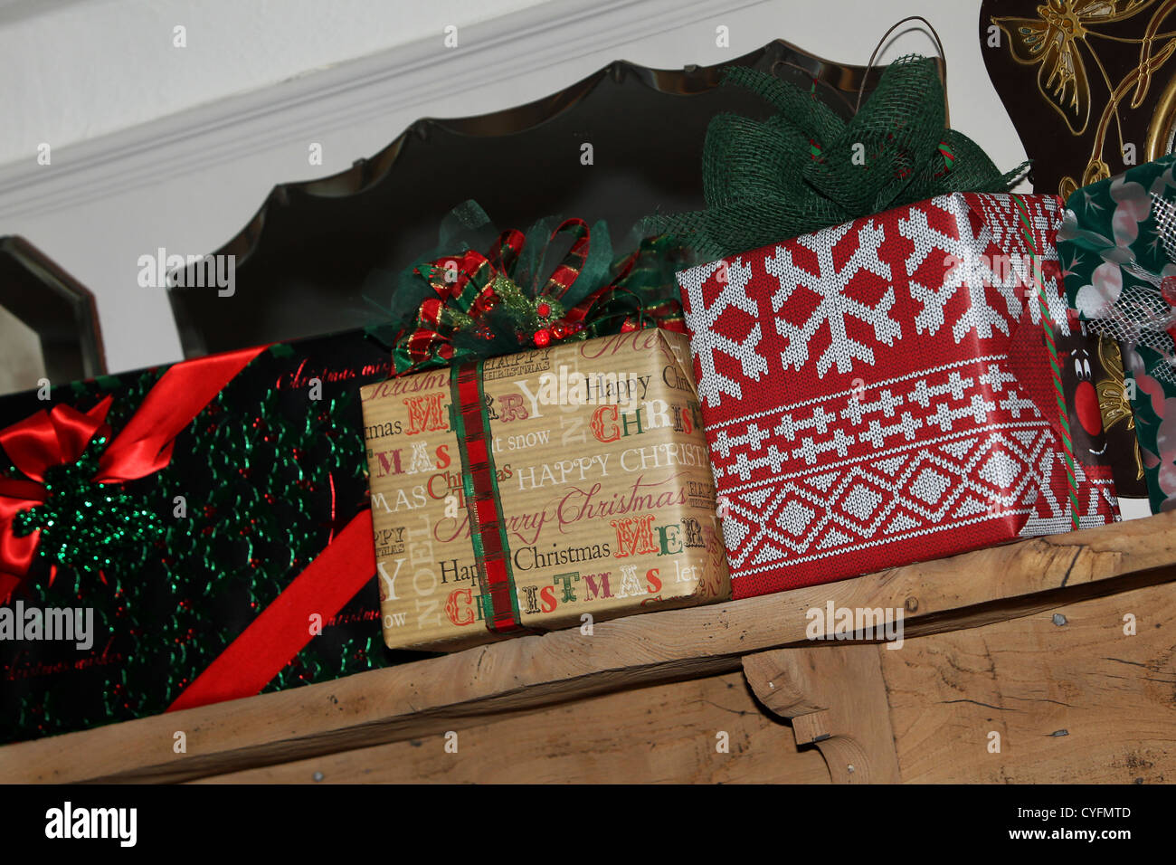 Presents above the fireplace in The Lamb pub in Angmering, Sussex, UK. Stock Photo