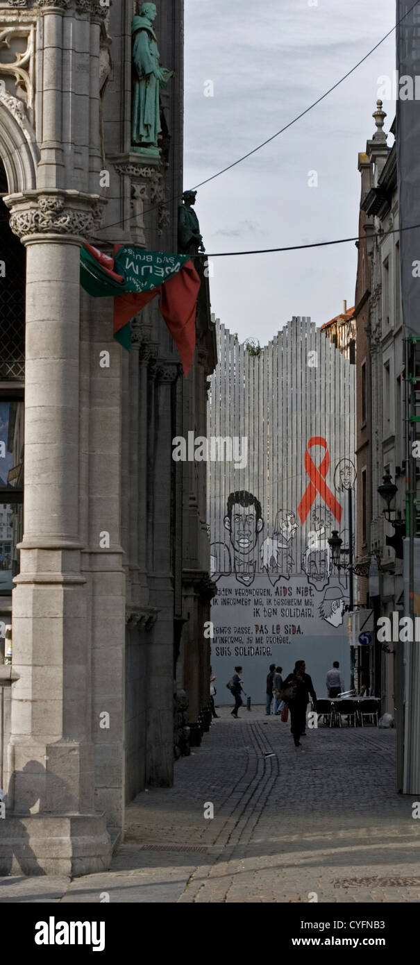 A hoarding in Brussels by the Grand Place showing campaign slogans regarding AIDS Stock Photo