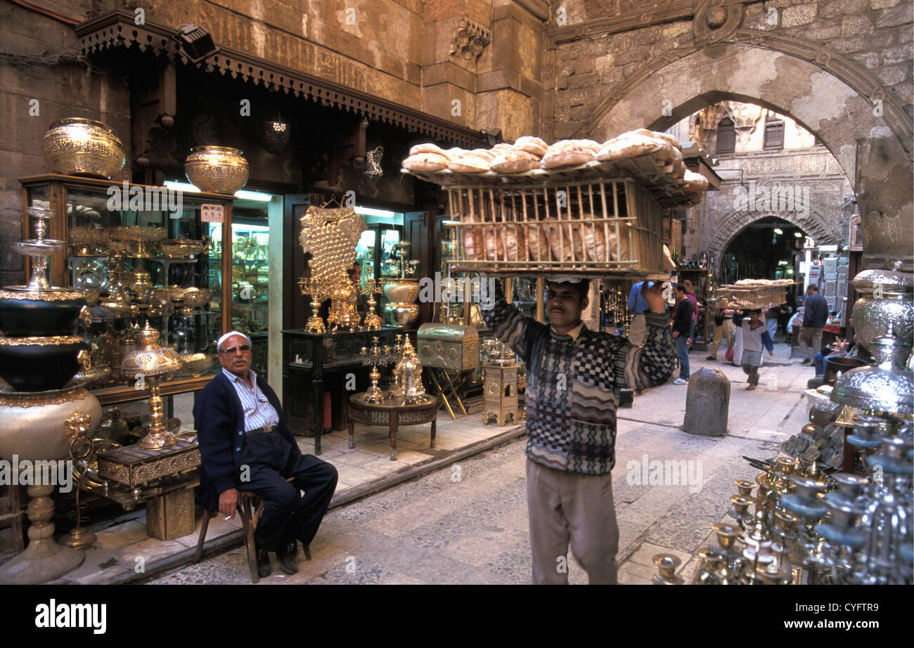 Egypt, Cairo, Market area, The great Bazaar of Khan al-Khalili, carrying bread Stock Photo