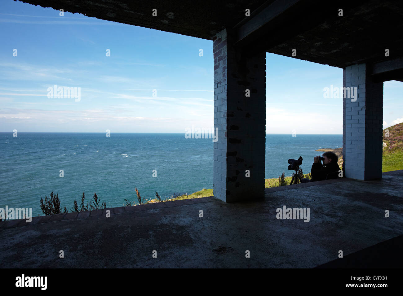 Bird Watcher in Observatory on Strumble Head, near Fishguard, Wales, UK Stock Photo