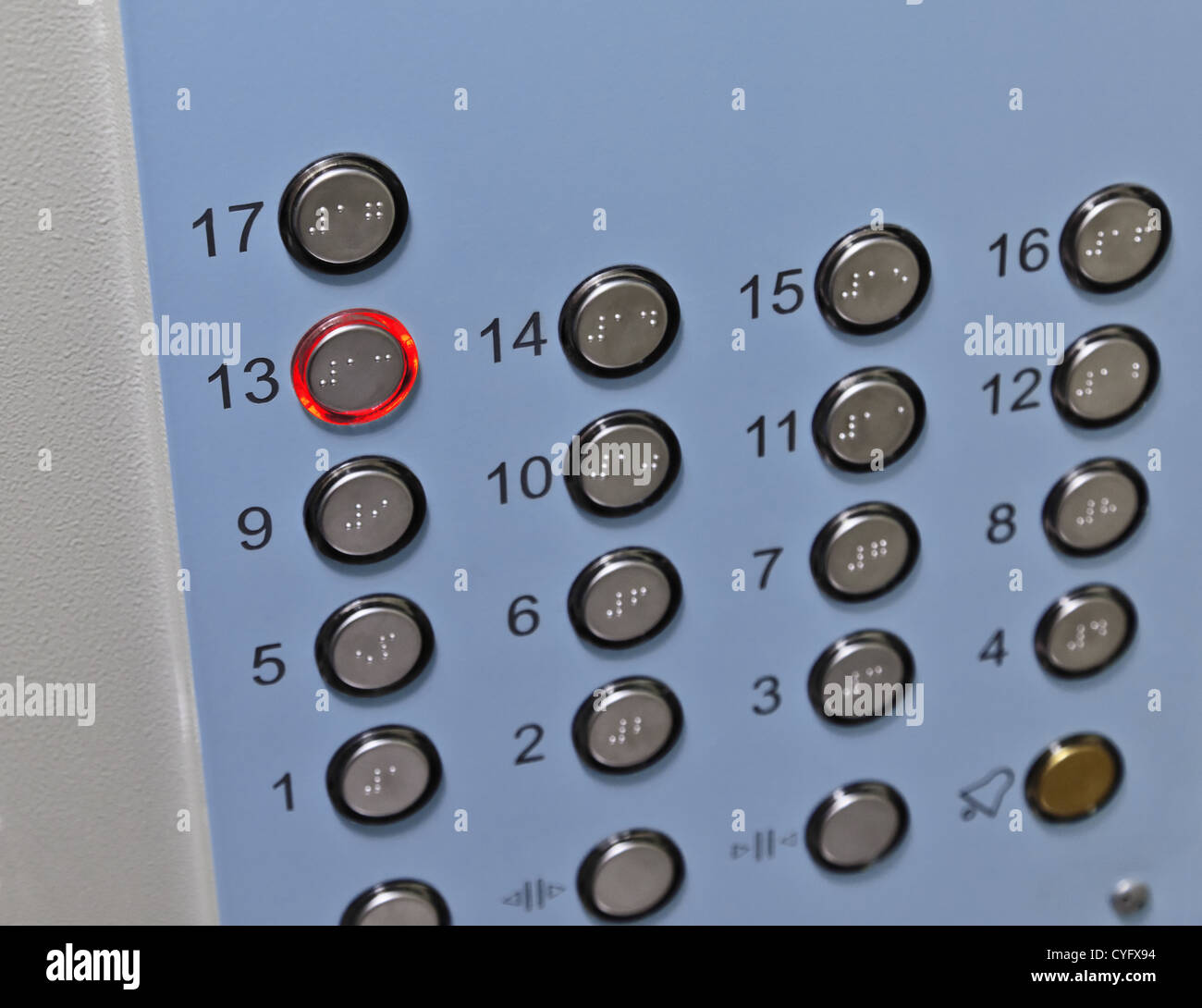Focus on the thirteenth floor button elevator control panel Stock Photo